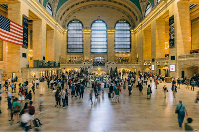 Group of people at railroad station