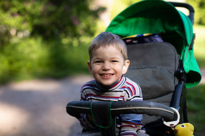 Portrait of boy playing in park