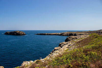 Polignano a mare, apulia. view of the rocks overlooking the sea.