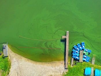 High angle view of deck chairs on shore