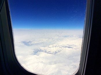 Scenic view of snowcapped mountain against sky