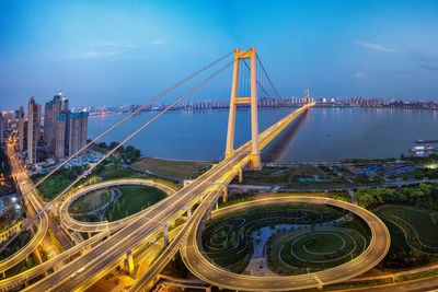 Aerial view of bridge in city