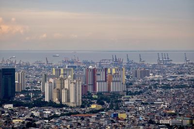 High angle view of cityscape against sky during sunset