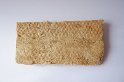 High angle view of bread against white background