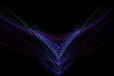 Abstract image of illuminated lighting equipment against black background