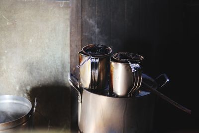 Kitchen utensils against wall at home