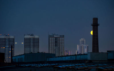 Modern buildings against clear sky