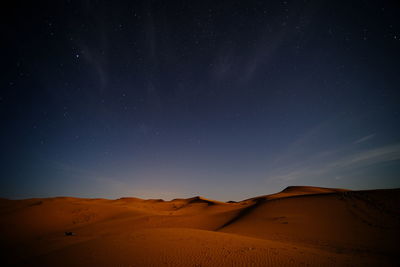 Scenic view of desert against sky