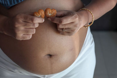 Close-up of woman with hands