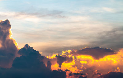 Low angle view of dramatic sky during sunset