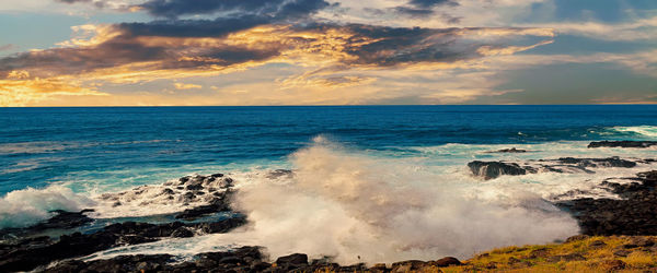 Scenic view of sea against sky during sunset