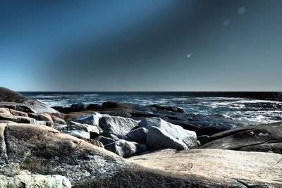 Scenic view of sea against clear sky