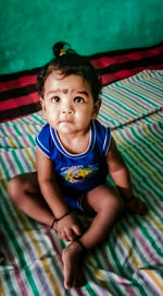 Portrait of cute baby at home