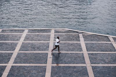 Reflection of woman in water