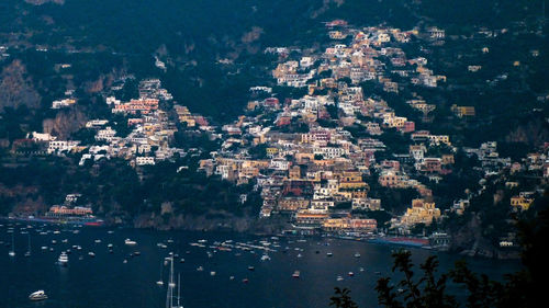 Early morning high angle view of city of positano coastline on amalfi coast by sea