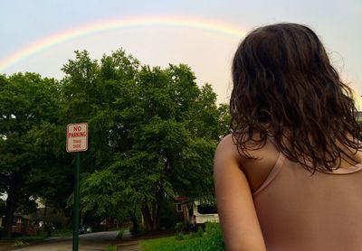 Scenic view of rainbow over trees