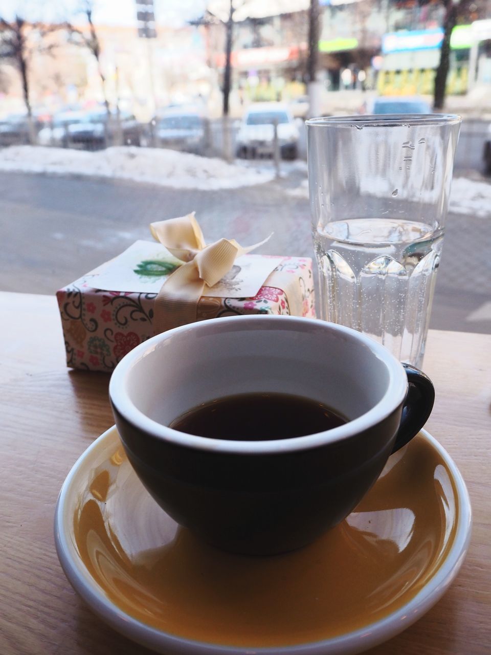 CLOSE-UP OF COFFEE ON TABLE