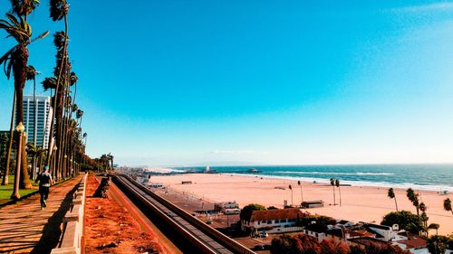 Panoramic view of beach against clear sky