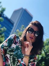Portrait of woman wearing sunglasses