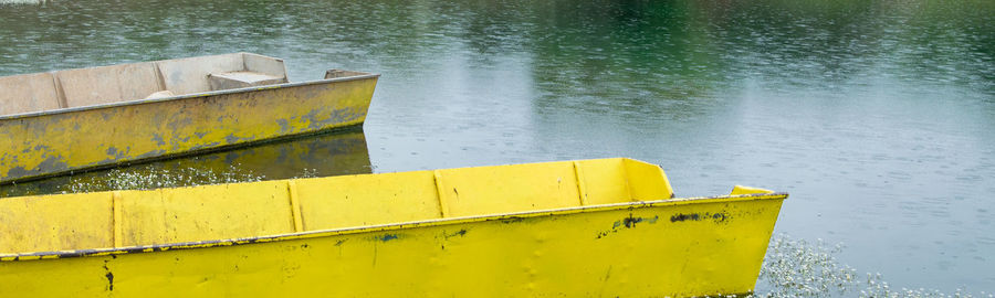 High angle view of yellow boat on lake