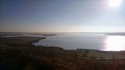 Scenic view of sea at sunset