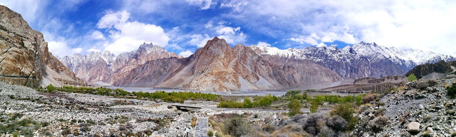 Panoramic view of snowcapped mountains against sky