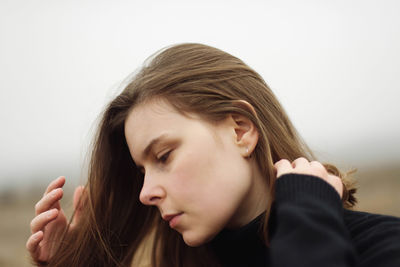 Outdoor portrait of a young woman.