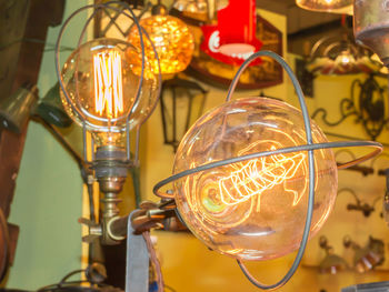 Close-up of illuminated light bulb