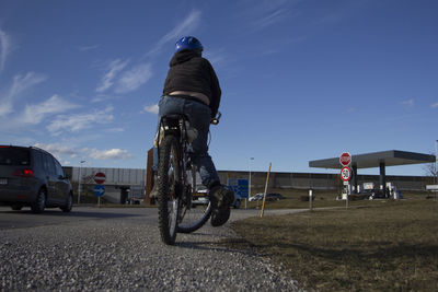 Bicycle on road against sky