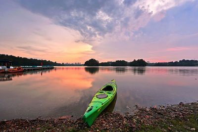 Scenic view of lake against sky during sunset