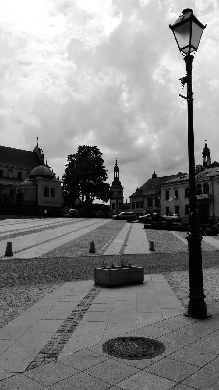 architecture, building exterior, built structure, sky, cloud - sky, outdoors, city, street light, tree, day, no people, nature