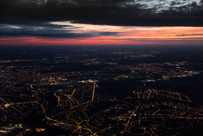 High angle view of buildings against sky during sunset