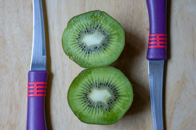 High angle view of fruits on cutting board