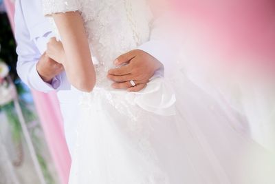 Close-up of couple dancing