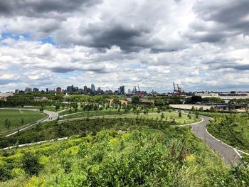 High angle view of trees and buildings against sky