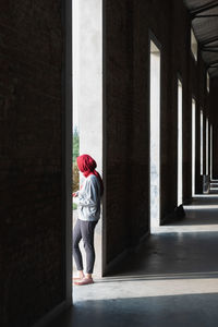 Full length of woman standing on floor