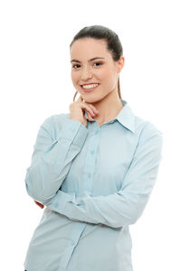 Portrait of a smiling young woman over white background