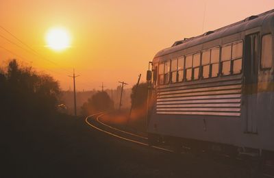 Train against sky during sunset