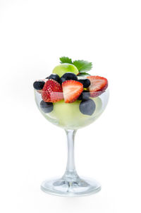 High angle view of dessert in plate against white background