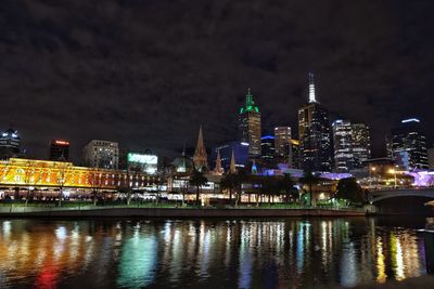 Illuminated buildings in city at night, melbourne australia 