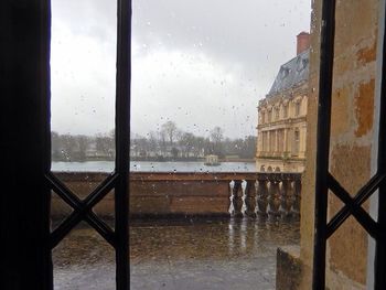 View of sea through window