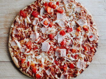 Directly above view of fresh pizza on table