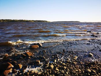 Scenic view of sea against clear sky