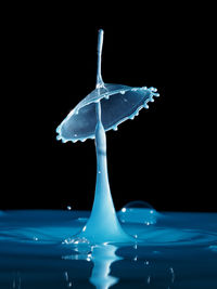 Close-up of water over black background
