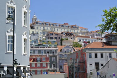 Residential buildings against clear sky