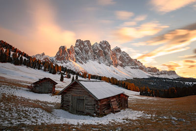 View of snowcapped mountain against cloudy sky