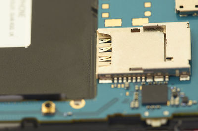 Close-up of circuit board over white background