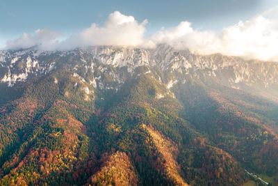 High angle view of trees and mountains against sky