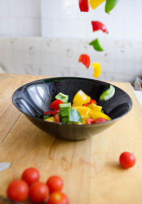Close-up of fruits in bowl on table