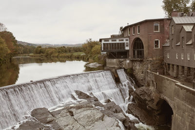 Overlooking ottauquechee river falls in the new england town of quechee, vermont 